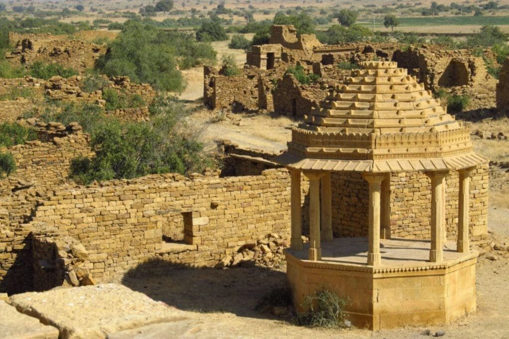 a stone structure with a roof